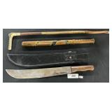 Carved Tire Thumper, Riding Crop, Machete.
