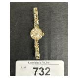 14k Gold Bezel Omega Wrist Watch.