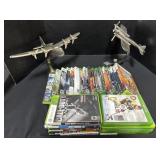 Xbox 360 Games & Airplane Statues.