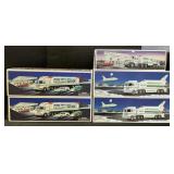 5 NOS Hess Trucks, Shuttles & Racecars.