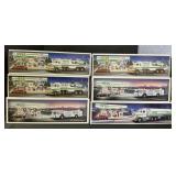 6 NOS Hess Trucks, & Racers.