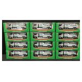 12 NOS 2001 Mini Hess Racer Transport Trucks.