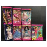 7 NOS 1990s Barbie Dolls.