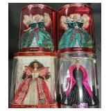 4 NOS Happy Holidays Barbie Dolls.