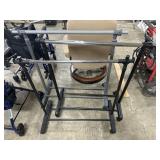 3 adjustable Clothing Racks.