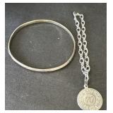 Pair Of Sterling Silver Bracelets.