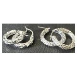 Pair Of 14 KT White Gold Earrings.