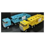 Pair of ERTL Die Cast Chevy Car Carrier Trucks.