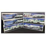 6 Vintage Hess Trucks.