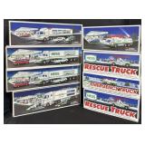 8 Vintage Hess Trucks.