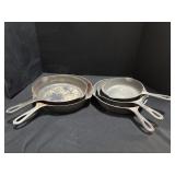 5 Wagner Cast Iron Skillets.