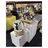 Disney Collectible Snow Globes.