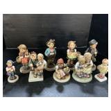 9 Goebel Hummel Figurines.