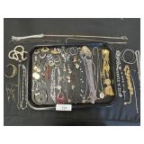 Costume Jewelry, Necklaces, Brooches, Earrings.