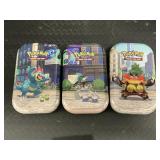 3 Tin Pokï¿½mon Card Cases W/Cards.