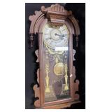 Antique Walnut Gingerbread Pendulum Wall Clock.