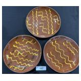 (3) Breininger Yellow Slip Redware Plates.