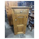 Grainy Oak Chimney Cabinet.
