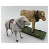 Pair of German Composition Stick Leg Toys.
