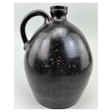 Glazed Redware Pottery Strap Handled Jug.