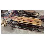 (2) Vtg Runner Sleds.