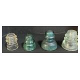 4 Glass Insulators.