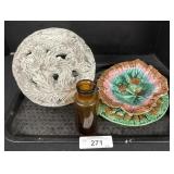 Majolica Plates Amber Bottle And Garden Orb.