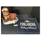 Finlandia Bar Mat, Smiley Boy Snowmobile Figure.