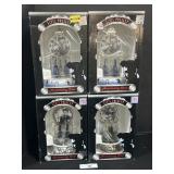 4 NOS Elvis Done Anniversary Mantel Clocks.