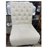 Tufted Slipper Chair.