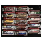 14 NOS Marchbox Die Cast Racing Transporters.