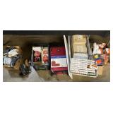 Suitcase, Ice Skates, Ornaments, Collector Plates.