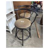 (2) Upholstered Swiveling Barstools.