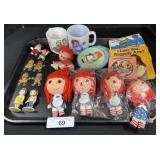 Raggedy Ann Dolls, Cups, Books, Figures.