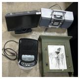 18-Inch TV, Boombox, Ice Maker, Cabinet.