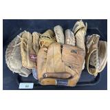 Lot Of Baseball Gloves.