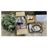 DVD Movies, Faux Plant, Electrical Outlets.