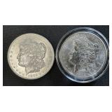 Pair Of Morgan Dollars.