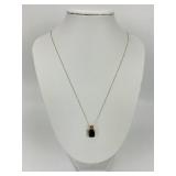 14KT Gold Emerald Cut Garnet Pendant Necklace.