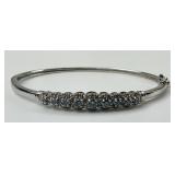 14KT Gold Blue Topaz & Diamond Chip Bangle.