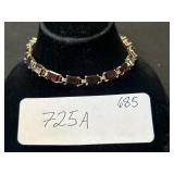 14K Gold Emerald Cut Garnet Bracelet.