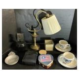 Brass Lamp, Bushnell Binoculars, CupFone, Teacups.