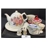 Floral Teapot, Small Dishes, Mugs.