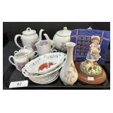 Teapot, Teacups, Plates, Bowls.