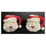 Pair Of Vintage Winking Santa Head Mugs.