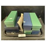 Empty Coin Storage Boxes.