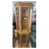 Corner Lighted Curio Cabinet.