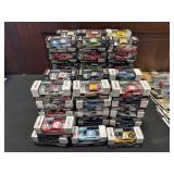 (64) NOS NASCAR Collectible DieCast Cars.