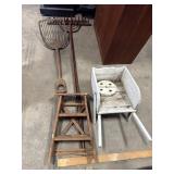 Wooden wheelbarrow, Rakes, step ladder.