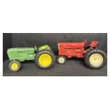 2 Cast Iron Toy Tractors.